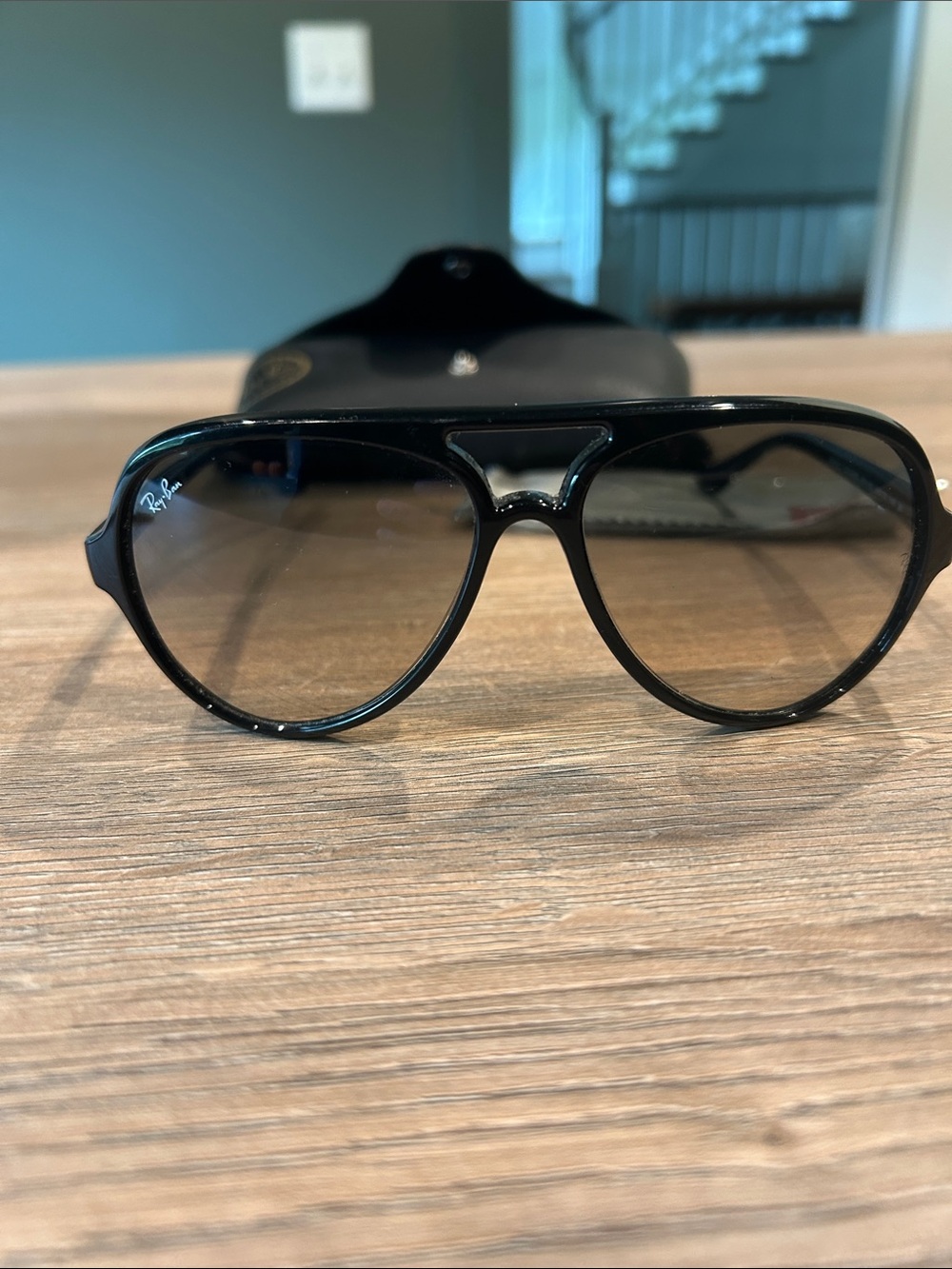 Ray-Ban Black Frame Sunglasses with Gradient Brown Lenses